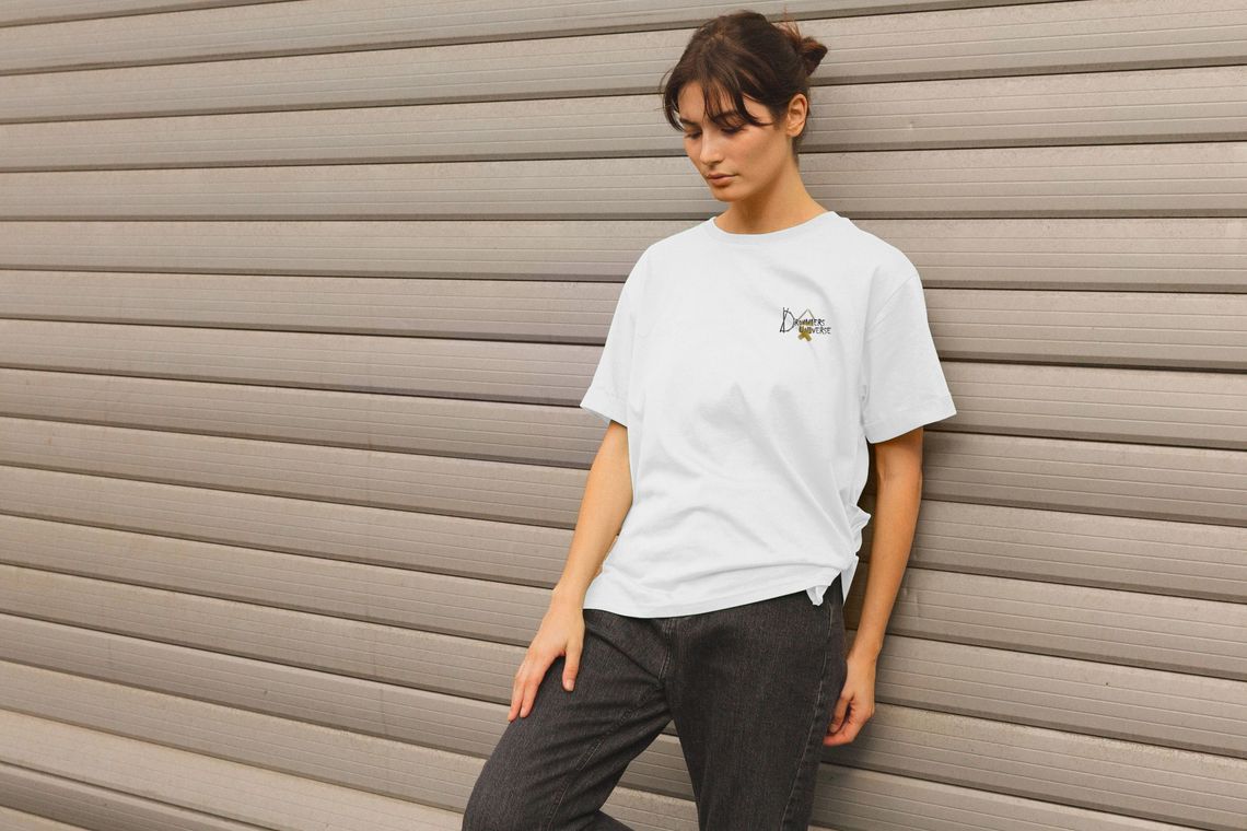 women's relaxed fit tee from Above Average Clothing. Made from 100% organic cotton and featuring split sides and rolled sleeves