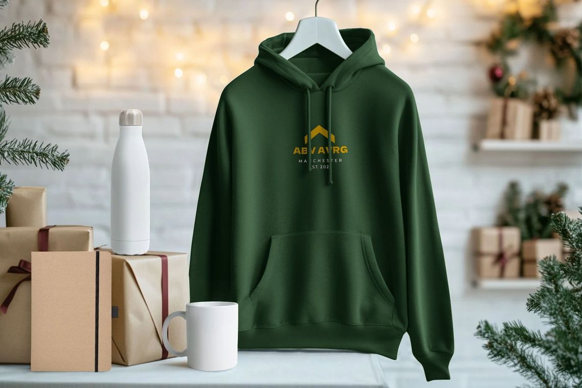 Above Average Manchester est 2025 hoodie in green. Produced ethically from sustainable 100% organic cotton