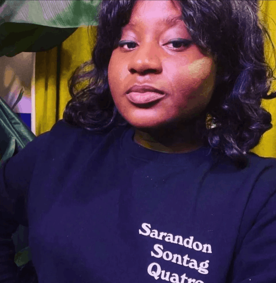 Actress Susan Wokoma wearing The Susan Sweater from Branded + Moniker.