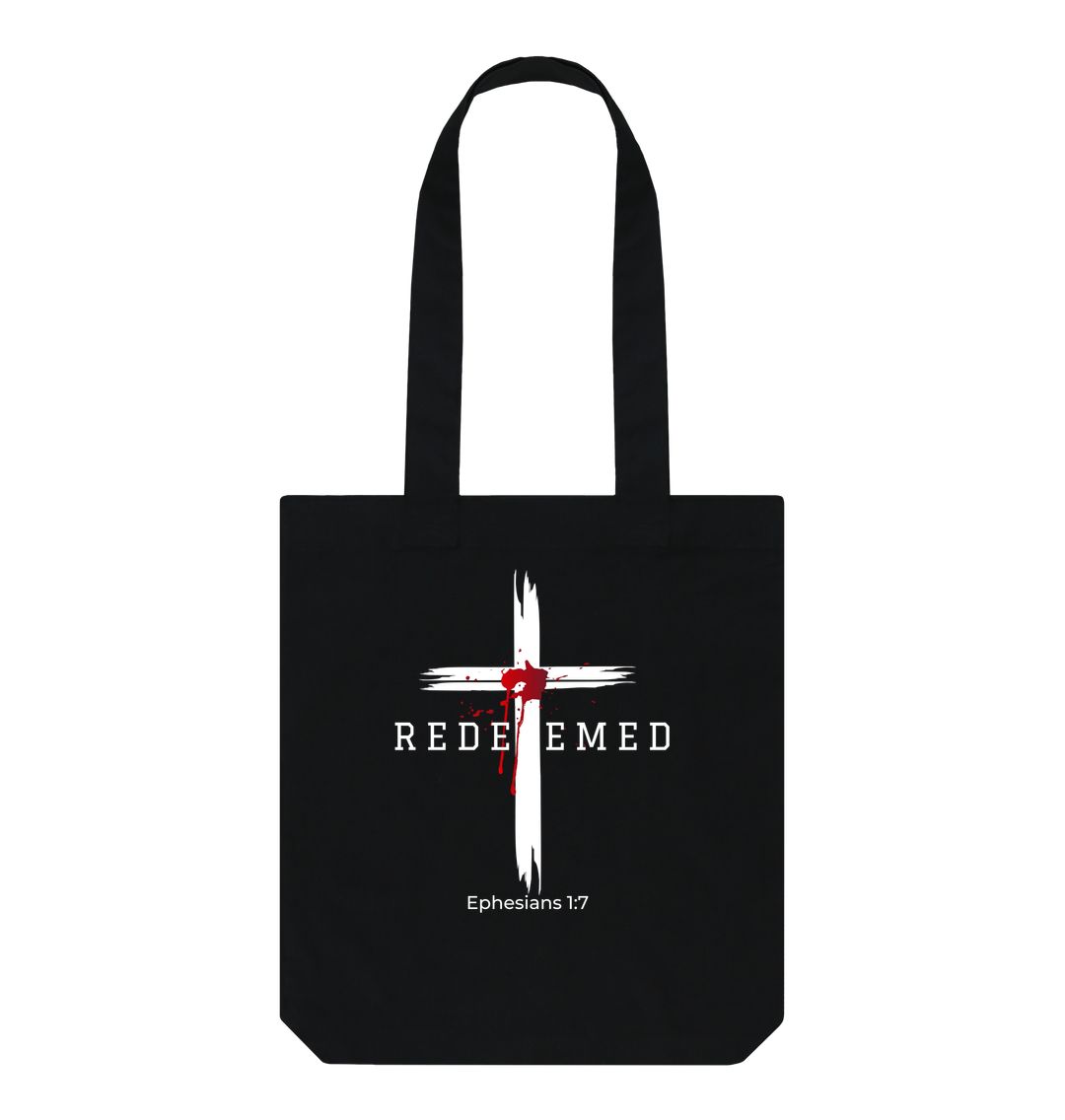 Ephesians 1:7 - Redeemed by the blood of Jesus Organic cotton Tote bag