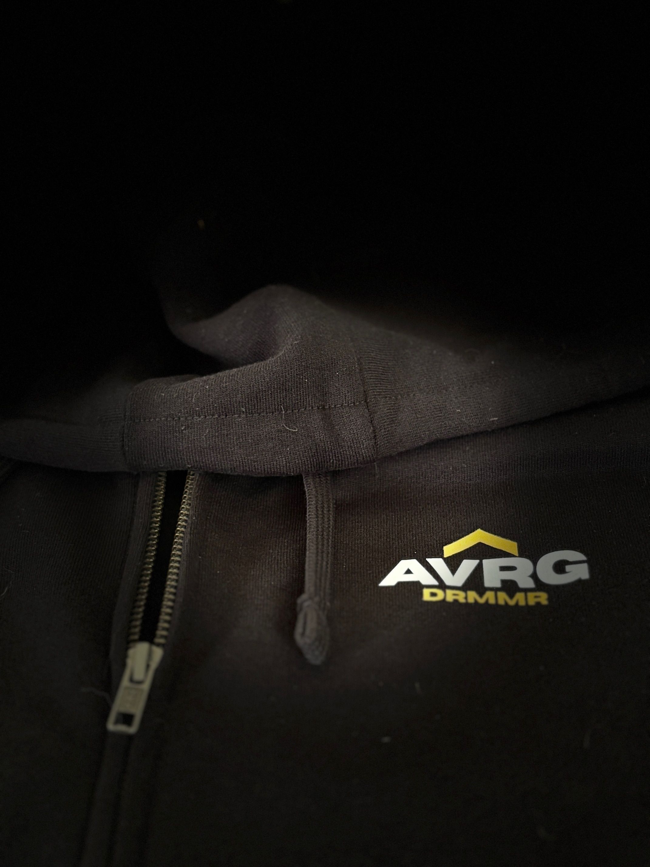 Above Average DRMMR drummer full zip up hoodie product photography with mood lighting