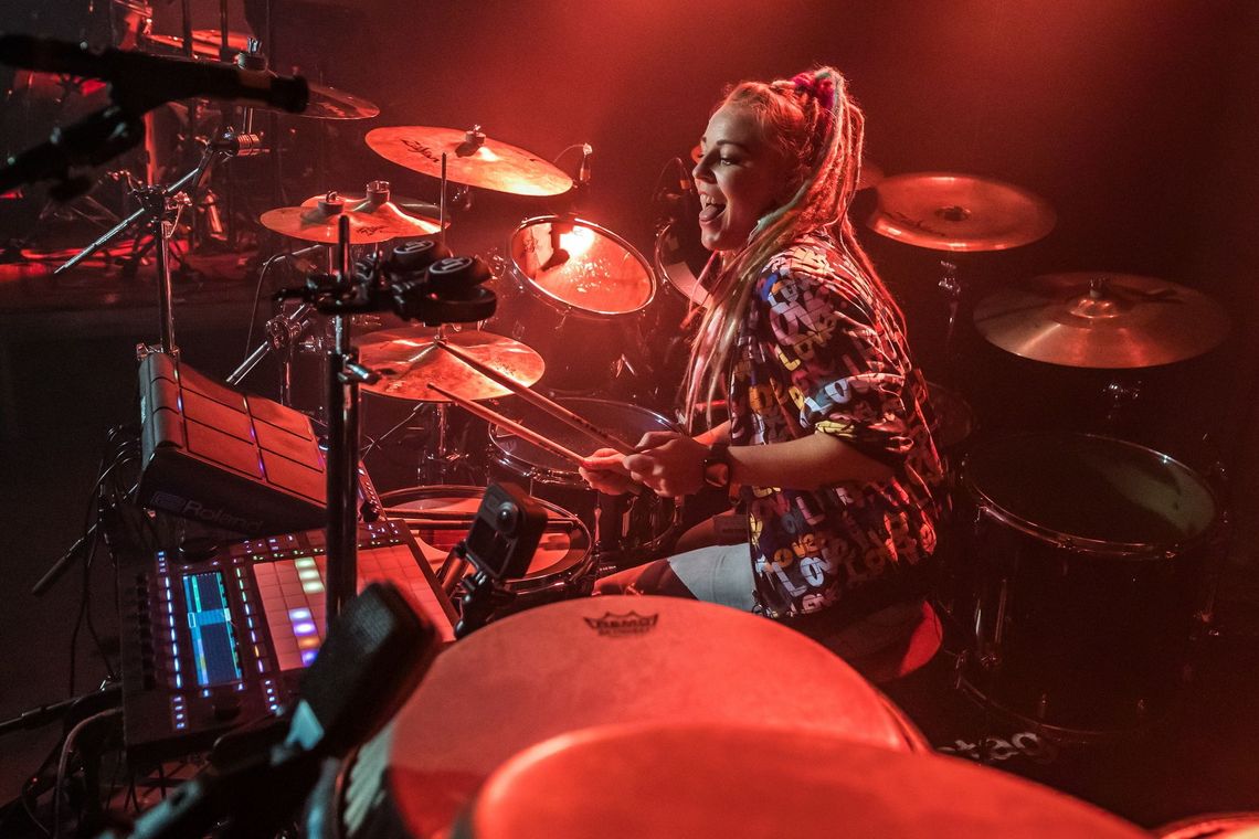 Vicky O'Neon playing drums