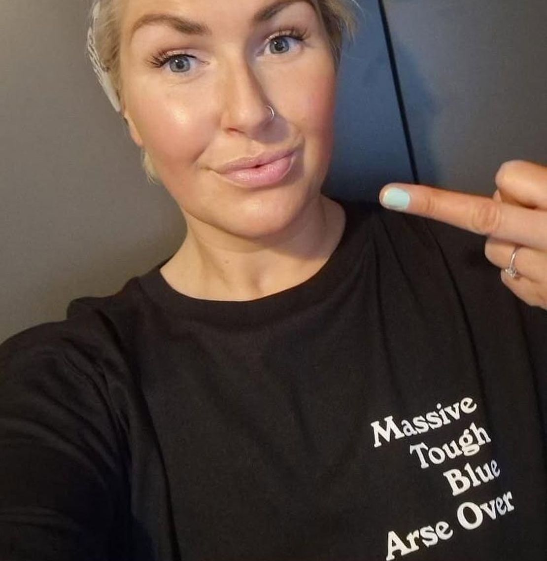 The Tit Tee in black with white printing from Branded + Moniker.